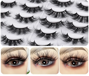 Detailed view of dense curly false eyelashes set and professional on-eye makeup effect