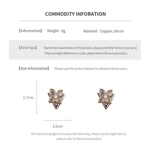 Detailed view of copper flower earrings with zircon, size 1.7cm height and 1.6cm width