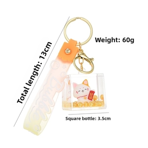 Detail view of Maneki Neko acrylic keychain with size measurements 13cm and 3.5cm