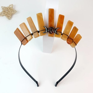 Handmade crown headband featuring orange crystals with crescent moon and star accents