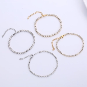 Classic tennis bracelet with round clear cubic zirconia in gold and silver stainless steel
