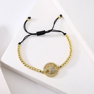 Gold 18K plated leopard head bracelet with white zircons and adjustable black rope