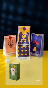 Detail of artistic oil painting style gift bags with colorful floral and animal patterns