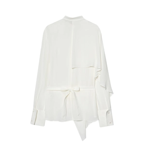 Elegant white long sleeve round neck shirt with asymmetrical hem and waist tie detail
