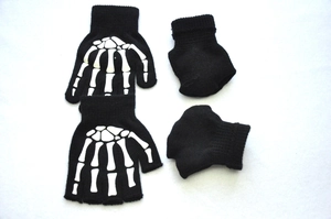 Glow-in-the-dark skull hand bone print on black fingerless knitted cycling gloves