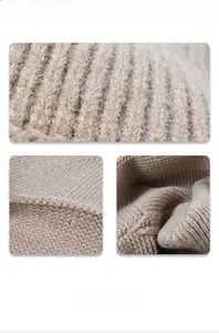 Macro view of oatmeal ribbed knit fabric with soft plush texture and detailed craftsmanship
