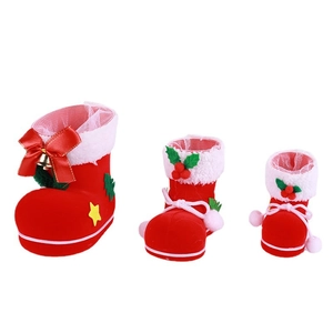 Three-piece red flocked Christmas boots set with white fur trim and festive ornaments