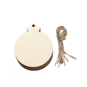 Stack of unfinished natural wooden round ornaments with jute twine for DIY Christmas crafts
