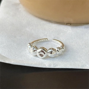 Irregular textured 925 sterling silver open ring featuring a unique bubbly design