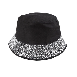 Macro detail of sparkly silver rhinestones on the brim of a black disco bucket hat