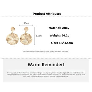 Detailed size and weight specs for gold textured round earrings with silver pins