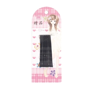 Set of 10 black wave hair pins on pink cardboard display with rounded tips