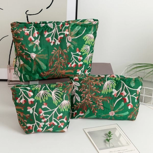 Lot de trois trousses de maquillage vertes à fleurs pour voyage et cosmétiques