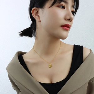 Festive Chinese style gold plated stainless steel necklace with a round Fu character pendant