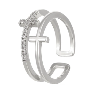 Detail of double-layer silver ring featuring a sparkling cross with pavé zircon stones