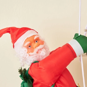 Classic red climbing Santa Claus plush doll ornament on a rope for Christmas decoration