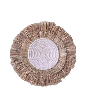 Bohemian round raffia wall decor with woven white cotton rope and natural grass fringes