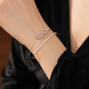Double-layered zircon cuff bracelet with chic interlocking links in silver finish
