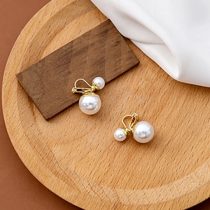 French vintage style pearl stud earrings with gold finish and double pearl design