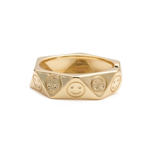 Polygonal gold smiley face open ring featuring engraved geometric expressions on facets