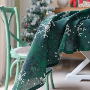 Nappe de Noël verte avec flocons de neige blancs et tissu texturé en coton et lin