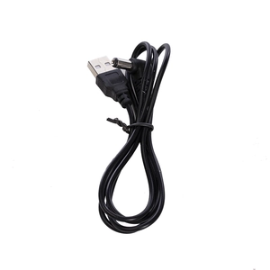 Close-up of the black USB-A to DC power cable for LED Christmas village glowing houses