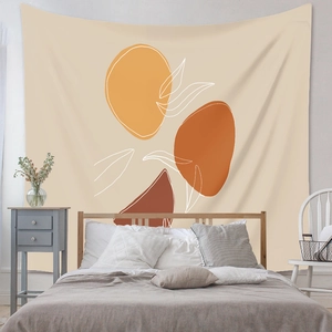 Abstract bohemian wall tapestry with earthy tones and leaf lines in a cozy bedroom setting