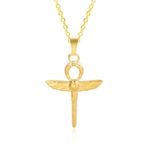 Macro shot of gold Ankh cross pendant with detailed scarab wings and feather textures