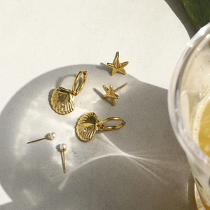 Detailed set of gold starfish, shell with crystals, and pearl stainless steel earrings