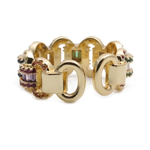 Close-up of golden chain link ring featuring multicolor zircon stones in refined settings