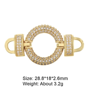 Detail view of gold zircon heart connector for necklaces with dimensions 28.8 by 18 mm