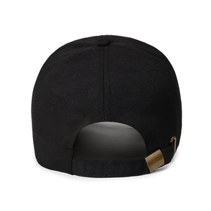 Rear view of minimalist black cotton baseball cap with adjustable retro brass buckle