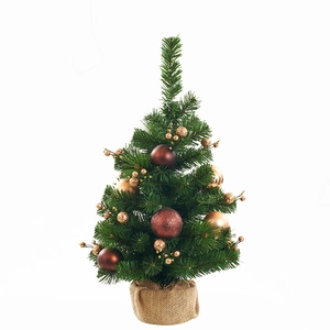 Miniature green Christmas tree with pine cones and gold ornaments on a burlap base