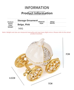 Macro view of pumpkin carriage jewelry box with cream enamel and sparkling rhinestones