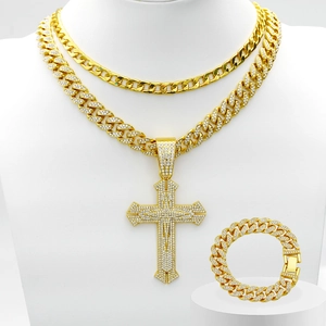 Men's hip hop gold jewelry set with iced out cross pendant, Cuban chain, and bracelet