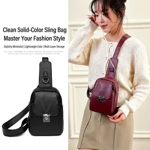 Sac de poitrine en cuir véritable pour femme avec rivets en V et fermoir métallique