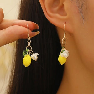 Vibrant yellow lemon drop earrings with white flower and green leaf details for women
