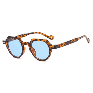 Retro small round tortoiseshell sunglasses with light blue lenses for a vintage fashion look