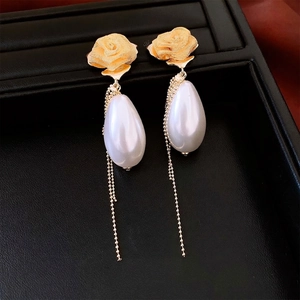 French palace style earrings with gold rose, large drop pearl and long tassel chains