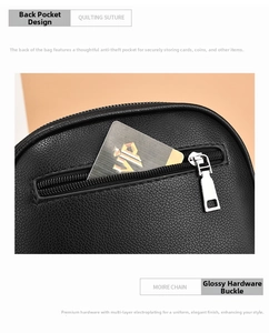 Detail view of the secure anti-theft back pocket on black litchi grain leather bag
