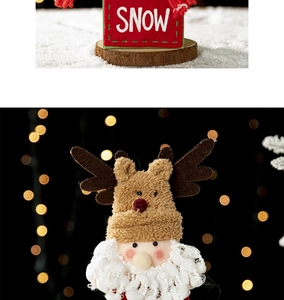 Close-up of Santa Claus figure with Snow logo base for festive Christmas decoration