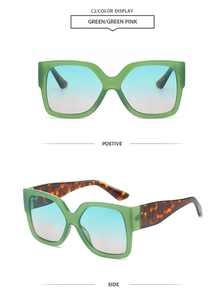 Vista de detalle de gafas de sol cuadradas verdes translúcidas con lentes degradadas