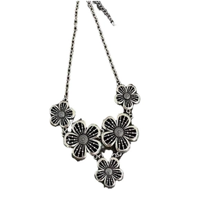 Detailed view of the antique silver floral pendant necklace with adjustable chain
