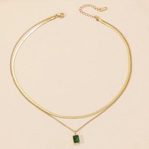 Double layered gold titanium steel necklace with emerald green rectangular pendant charm