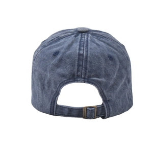 Detail of adjustable brass buckle and washed navy fabric on the back of the baseball cap