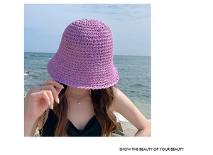 Close-up of bright purple crochet weave texture on a stylish women summer sun hat