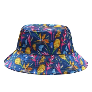 Floral print sun hat with tropical flowers and butterfly on navy blue fabric
