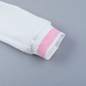Detail of pink striped elastic cuffs and fine stitching on white casual sweatshirt