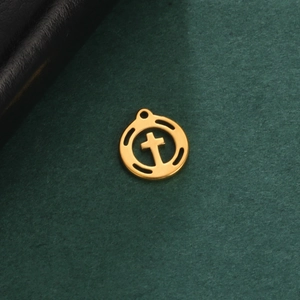 18K gold plated stainless steel circular pendant with cross design on green background