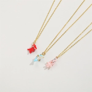 Cute gold chain necklaces with colorful cartoon dinosaur, whale, and bunny pendants